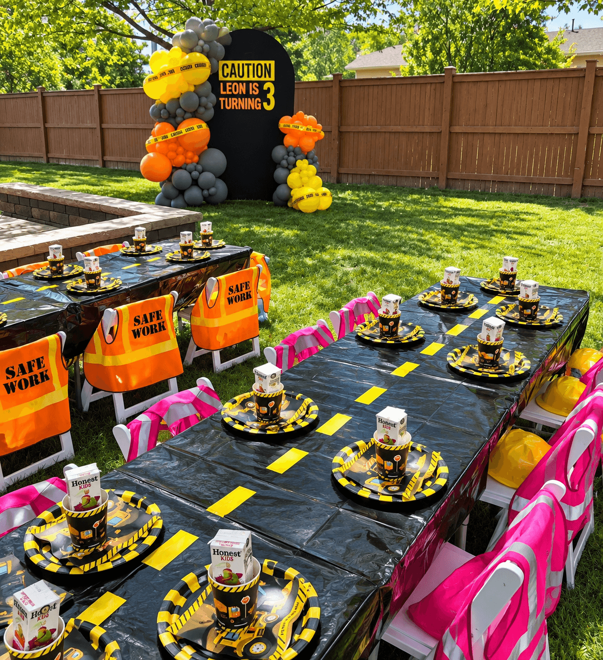 Construction-themed children's party tables and backdrop